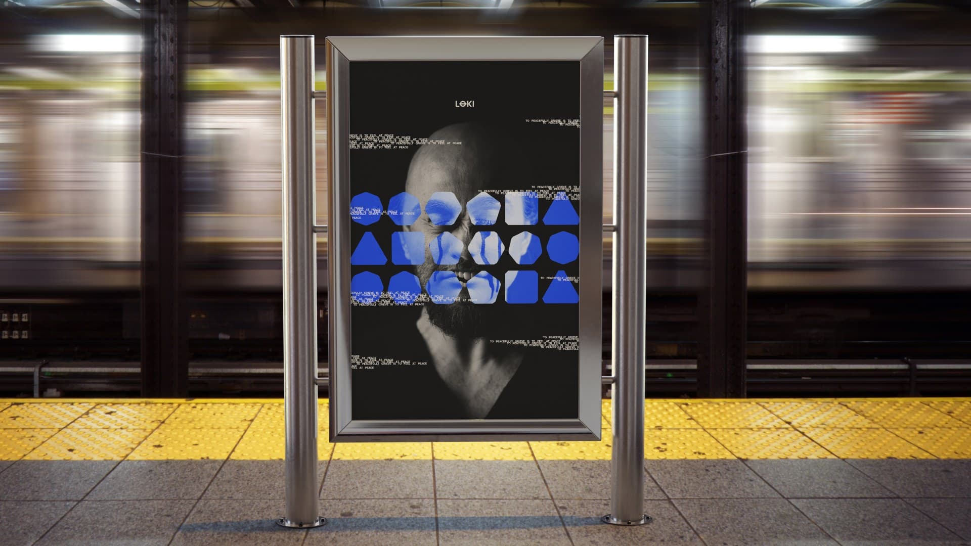 the blue grief poster in a lightbox frame on a subway platform, a train blurring past behind it